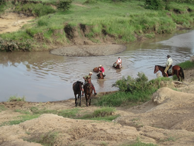 Fording the river. There had been rain for the last two weeks even though this was supposed to be the dry season.